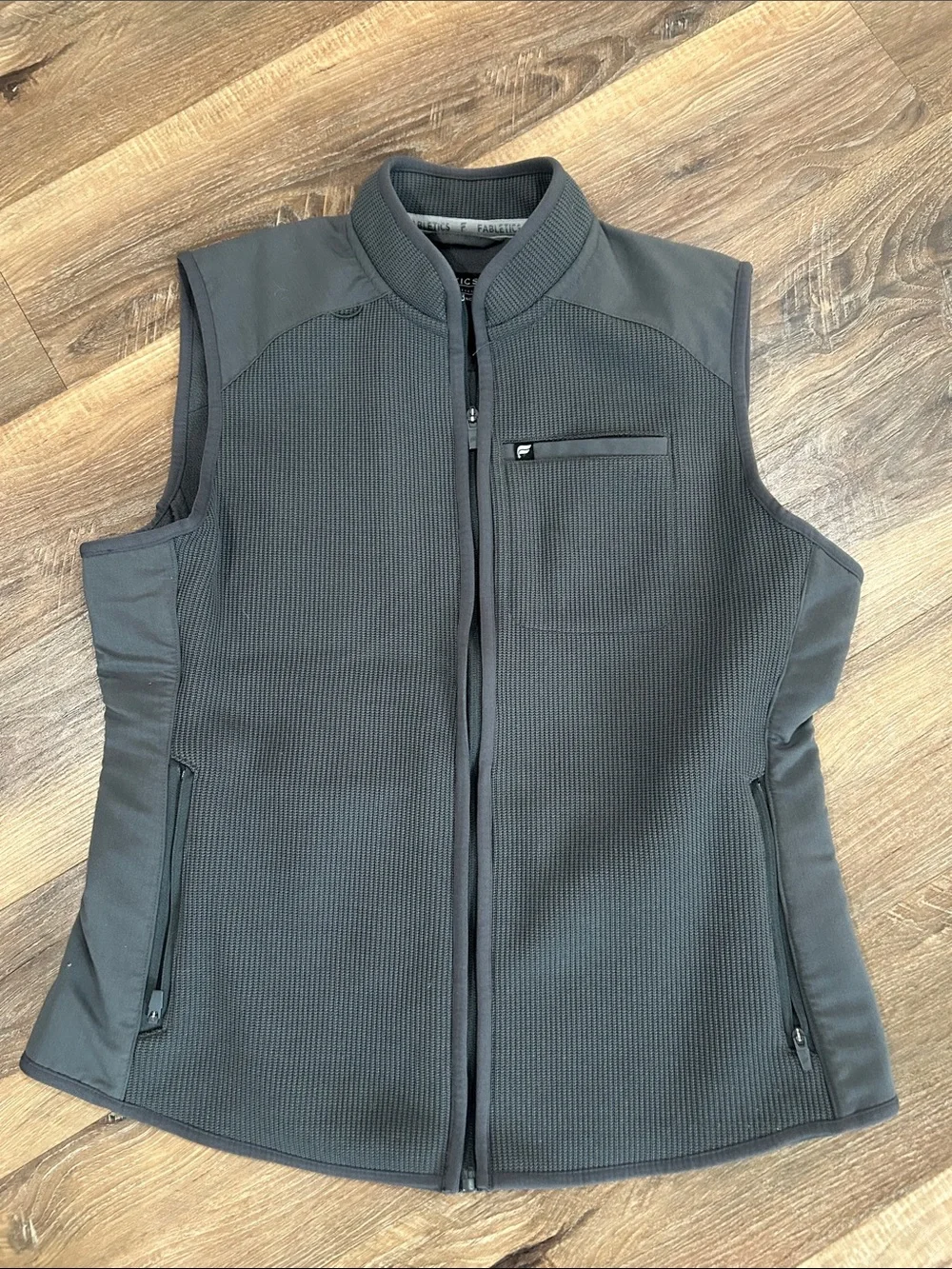 Fabletics men’s gray vest feel good performance, large zip pockets